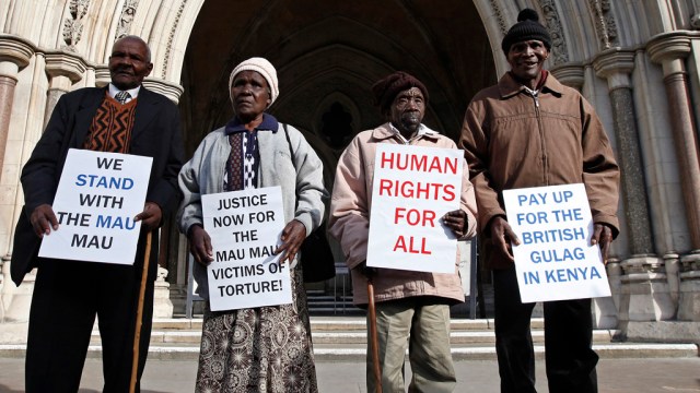 Nyingi, Muthoni, Nzili and Mutua stand outside the High Court in London
