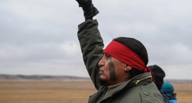 Protesters block highway 1806 in Mandan during a protest against plans to pass the Dakota Access pipeline near the Standing Rock Indian Reservation, North Dakota. REUTERS/Stephanie Keith